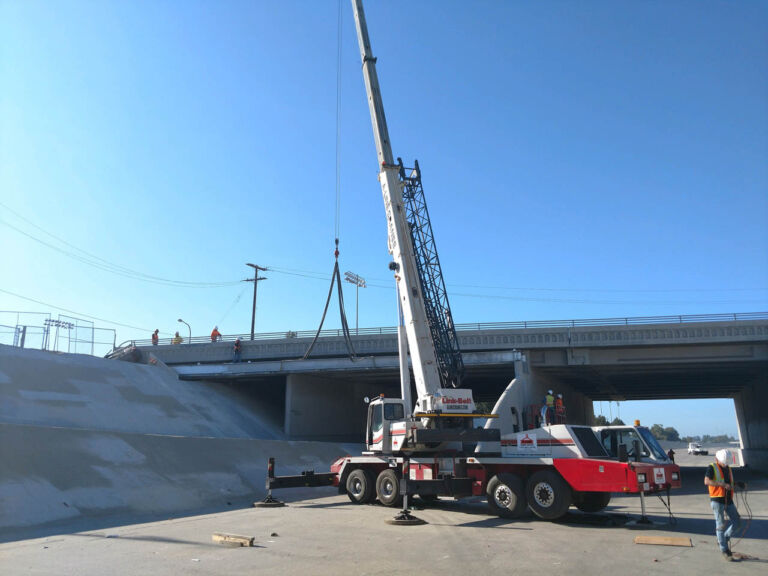 crane working on a freeway project